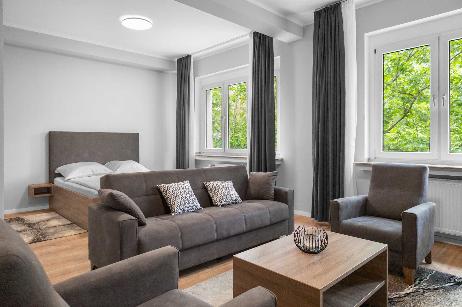 Domloge Köln Wohnbereich Bett